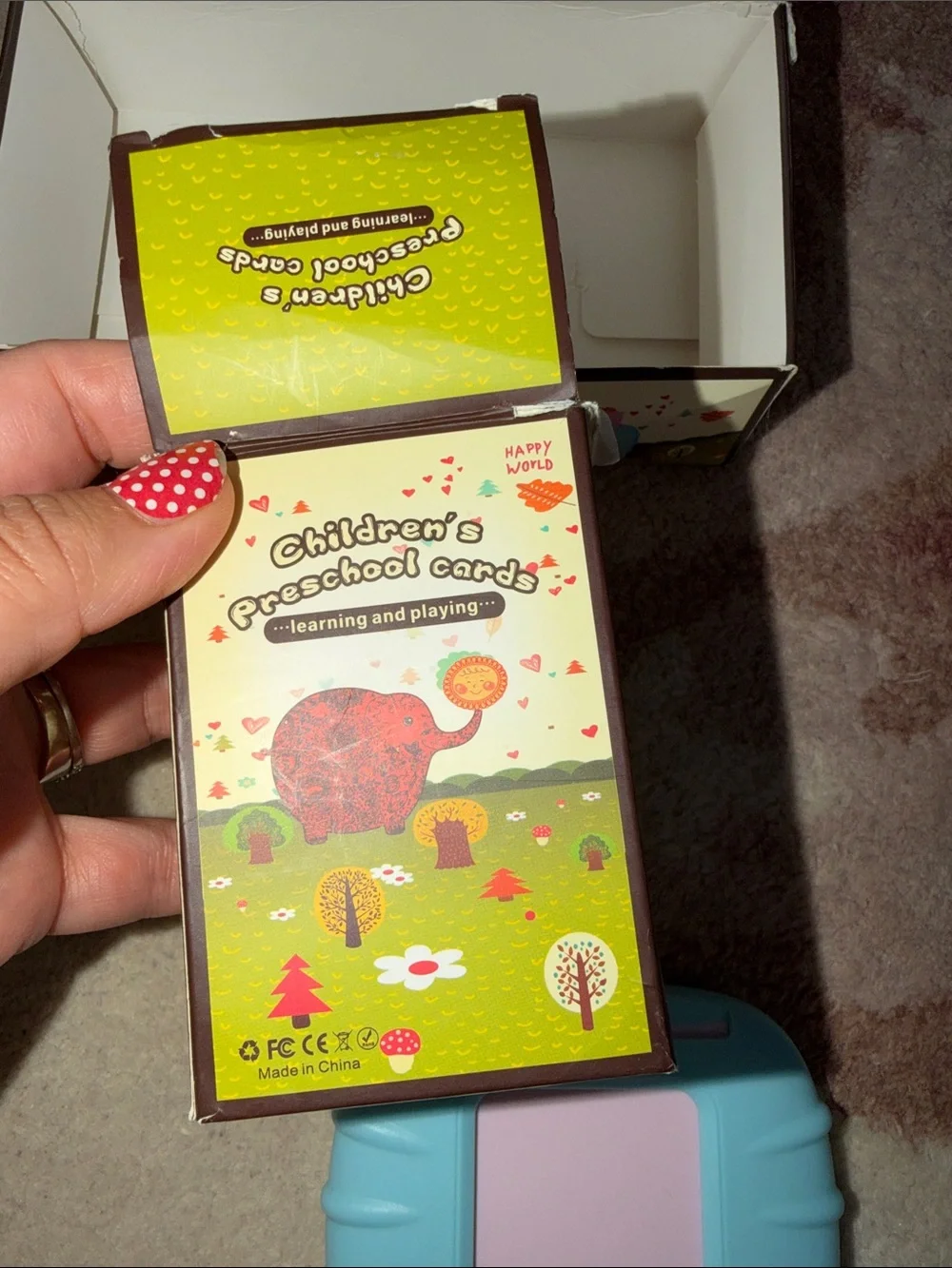Happy World Card Early Education Device, an interactive talking flashcard toy